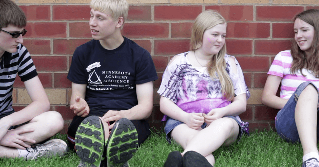 Teens Sitting Together