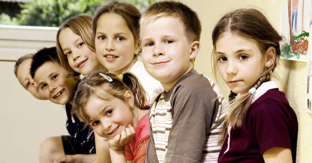 Children Sitting in a Row