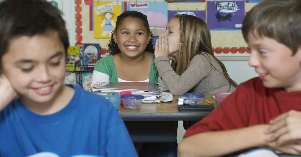 Students Gossiping in Class