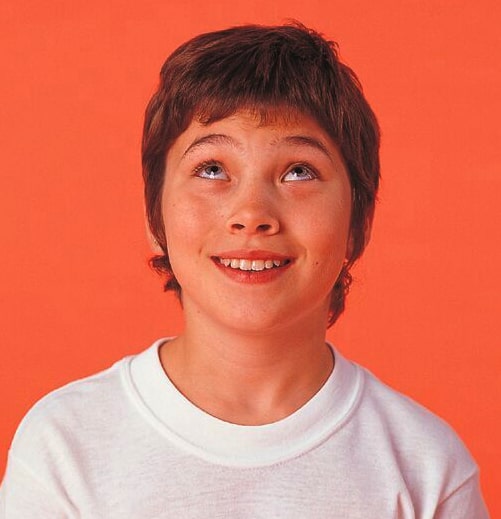 Child Doing Eyes Around the Clock Pose