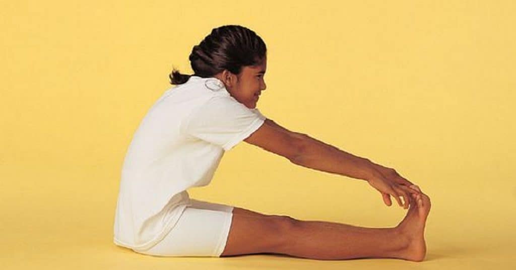 YogaKid in Peanut Butter and Jelly Pose