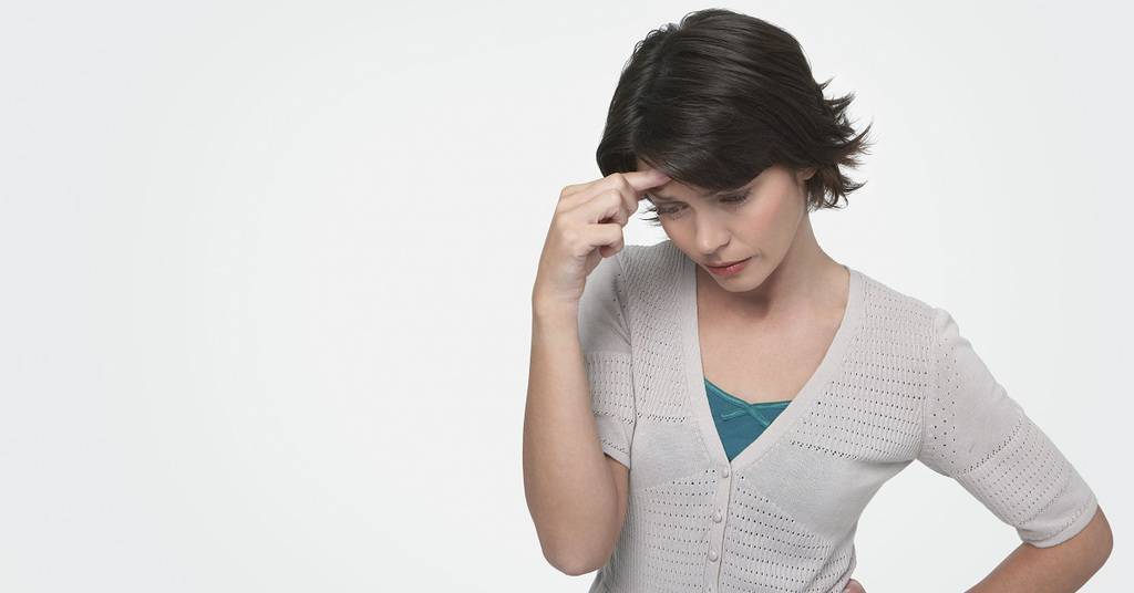 Woman with Head in Hands