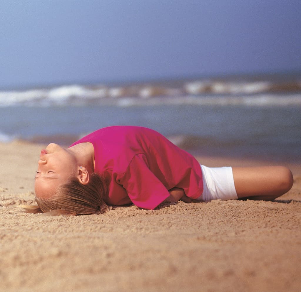 girl in bubble fish pose