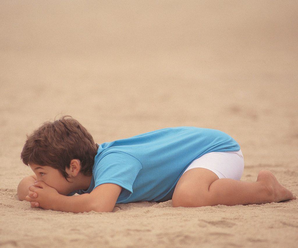 boy in polar bear pose