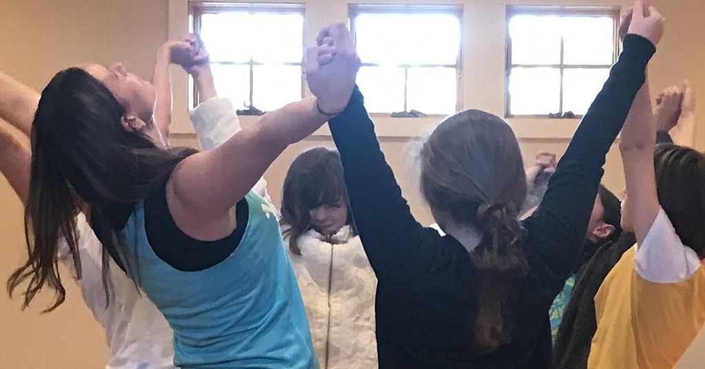 YogaKids class in Circle of Friendship Flowers Pose